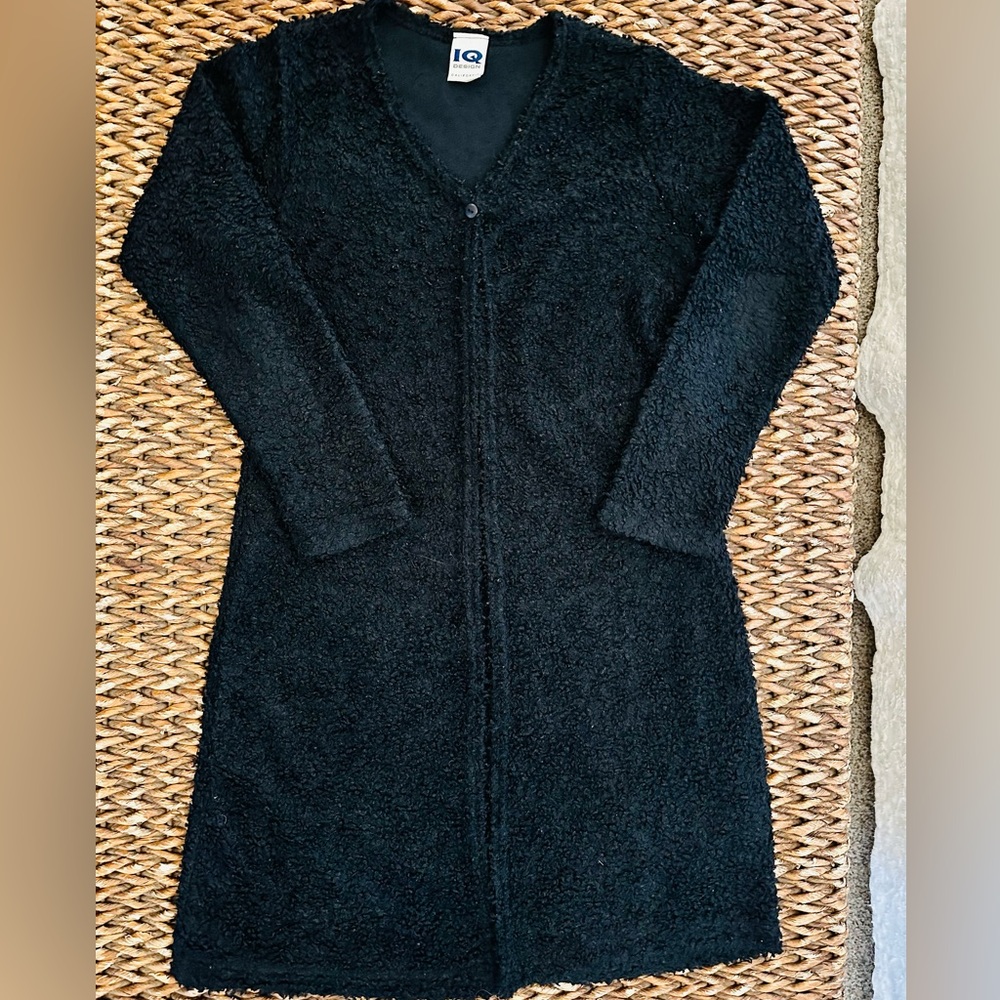 Black Cardigan Sweater. Long length. Two Pockets & top button closure. Small